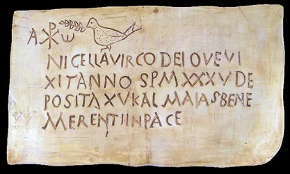Funerary inscription from Roman catacombs bearing the early Christian symbols